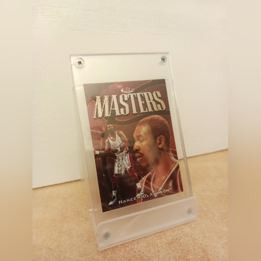 1997 Hakeem Olajuwon Houston Rockets Topps Finest Masters Refractor Card #195